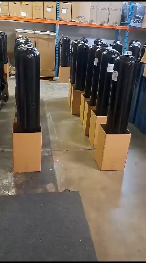 Rows of Falcon water treatment tanks stocked in the Houston warehouse